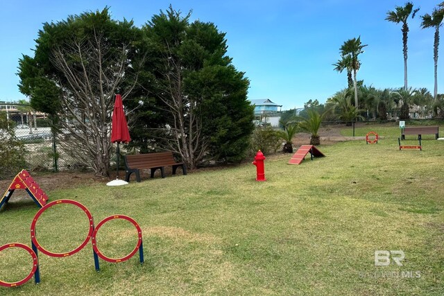 28107 Perdido Beach Blvd Unit D713, Orange Beach, AL 36561 - view of yard featuring fence