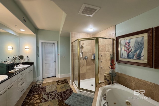 28107 Perdido Beach Blvd Unit D713, Orange Beach, AL 36561 - bathroom with a stall shower, a jetted tub, visible vents, and a sink