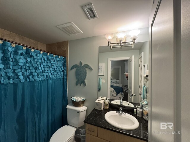 28107 Perdido Beach Blvd Unit D713, Orange Beach, AL 36561 - ensuite bathroom with ensuite bath, visible vents, an inviting chandelier, and vanity
