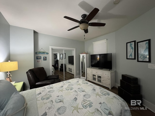 28107 Perdido Beach Blvd Unit D713, Orange Beach, AL 36561 - bedroom with baseboards, a closet, ceiling fan, and wood finished floors