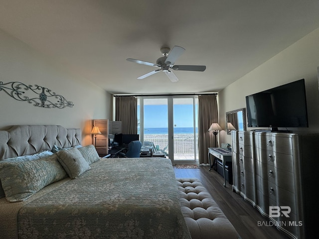 28107 Perdido Beach Blvd Unit D713, Orange Beach, AL 36561 - bedroom with a ceiling fan, access to outside, expansive windows, and dark wood finished floors