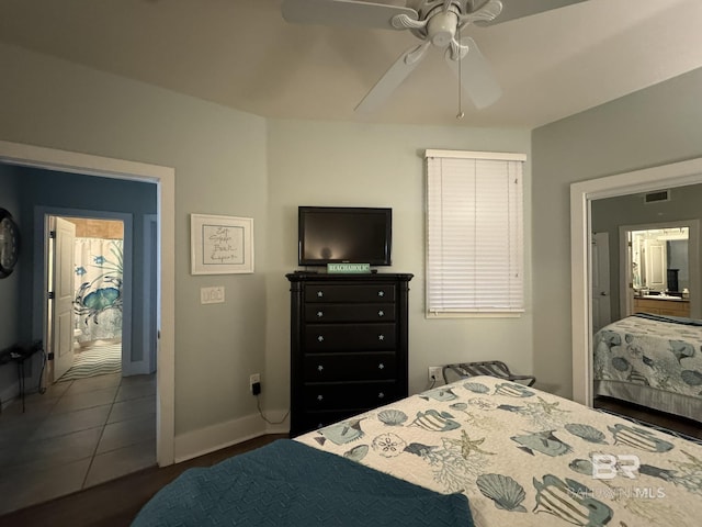28107 Perdido Beach Blvd Unit D713, Orange Beach, AL 36561 - tiled bedroom featuring baseboards, ceiling fan, and visible vents