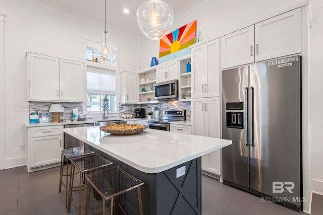 kitchen with stainless steel appliances and white cabinets