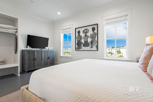 bedroom featuring crown molding