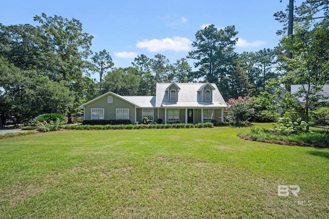 view of front of property with a front lawn