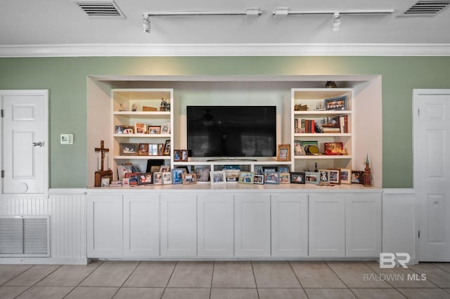 bar featuring built in shelves, white cabinetry, crown molding, and light tile patterned flooring