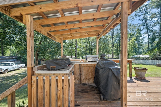 wooden terrace with area for grilling and grilling area