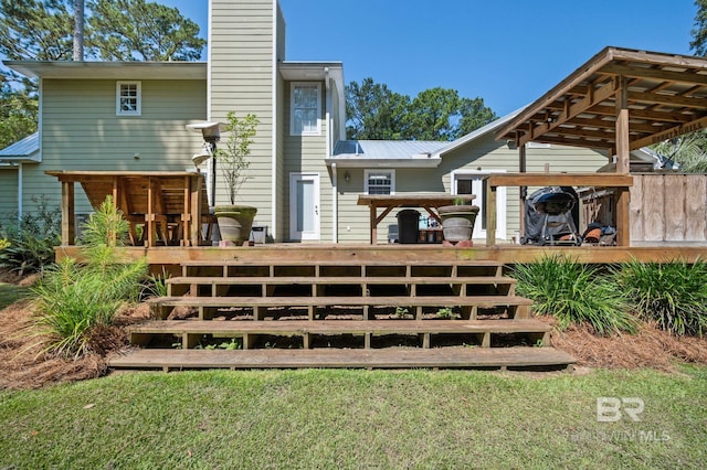 rear view of house with a deck