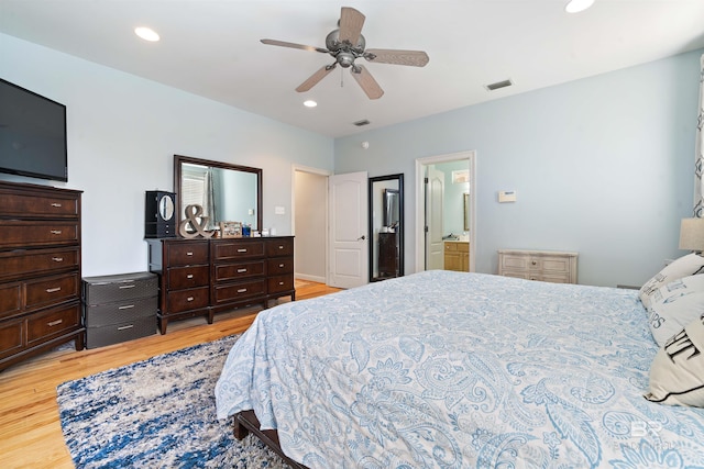 10197 Bellingrath Rd, Theodore, AL 36582 - bedroom featuring light wood-type flooring, recessed lighting, a ceiling fan, and connected bathroom