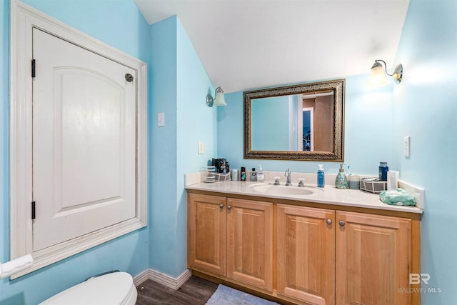 10197 Bellingrath Rd, Theodore, AL 36582 - bathroom with vanity and wood finished floors