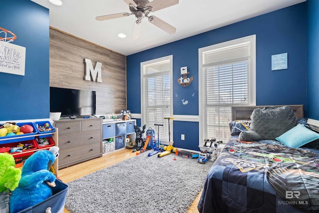 10197 Bellingrath Rd, Theodore, AL 36582 - bedroom featuring recessed lighting, a ceiling fan, wood finished floors, and an accent wall