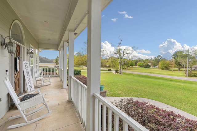 10197 Bellingrath Rd, Theodore, AL 36582 - covered porch with a lawn
