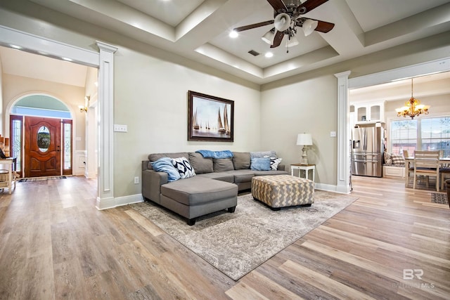 10197 Bellingrath Rd, Theodore, AL 36582 - living area featuring a chandelier, a ceiling fan, wood finished floors, coffered ceiling, and decorative columns