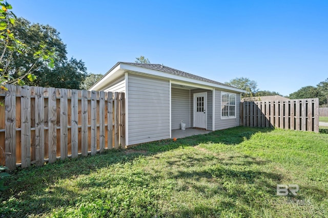 exterior space with a yard