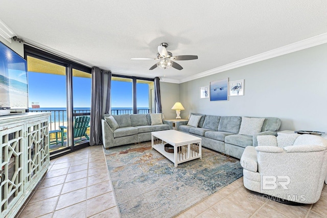 living room with crown molding, a textured ceiling, tile patterned floors, and ceiling fan