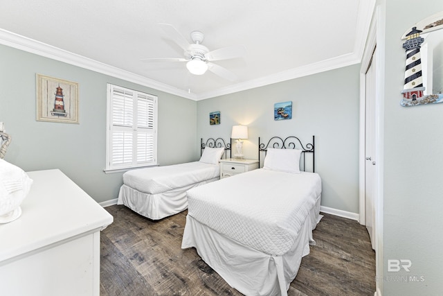 bedroom with crown molding, baseboards, ceiling fan, and dark wood-type flooring