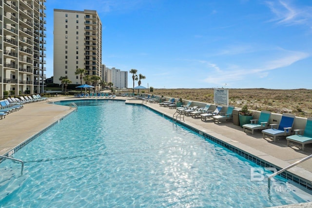 community pool with a patio