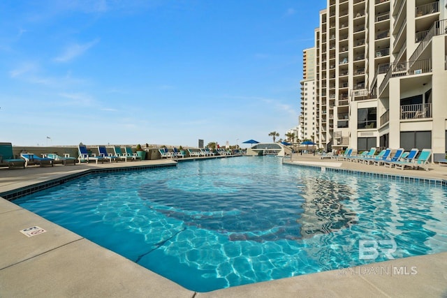 pool with a patio