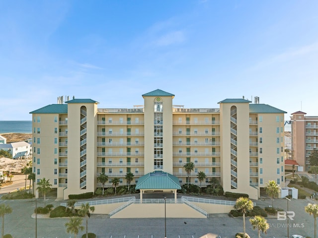 view of building exterior with a water view