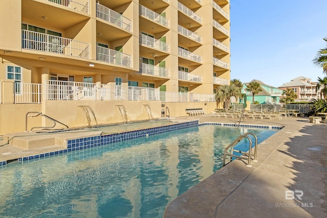 view of pool featuring a patio area