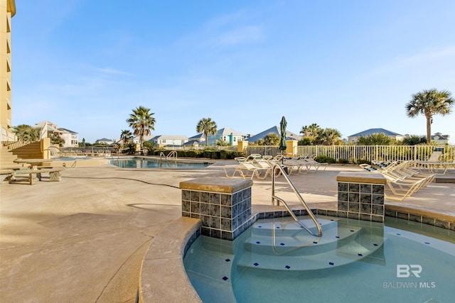 view of pool featuring a patio