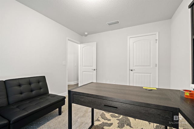 office area featuring carpet floors and baseboards