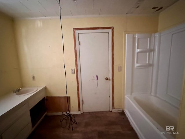 bathroom featuring vanity and hardwood / wood-style floors