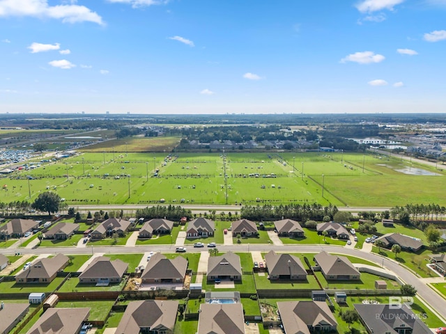 drone / aerial view featuring a water view and a rural view