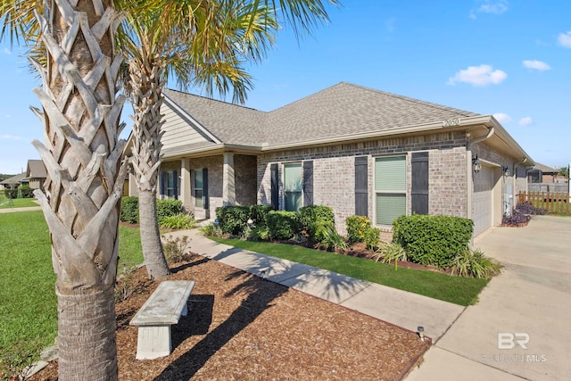 ranch-style house featuring a garage