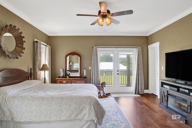 17541 Council Oaks Ln, Bon Secour, AL 36511 - bedroom featuring french doors, access to exterior, dark wood-type flooring, ornamental molding, and a ceiling fan