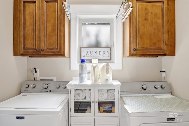 17541 Council Oaks Ln, Bon Secour, AL 36511 - laundry room featuring washing machine and clothes dryer and cabinet space