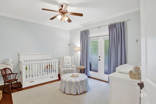 17541 Council Oaks Ln, Bon Secour, AL 36511 - bedroom with french doors, crown molding, wood finished floors, access to exterior, and a ceiling fan
