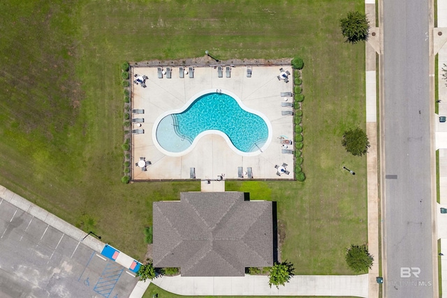 drone / aerial view of a pool area