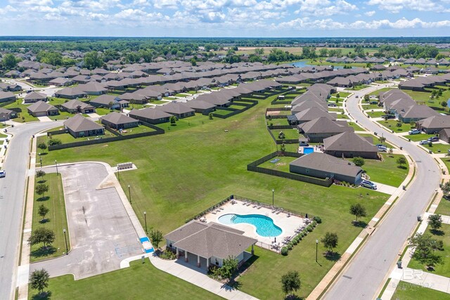 aerial view of residential area with a pool area