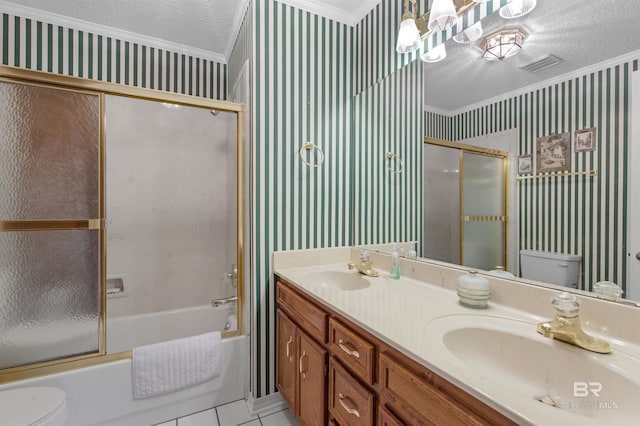 full bath featuring toilet, a textured ceiling, wallpapered walls, and a sink