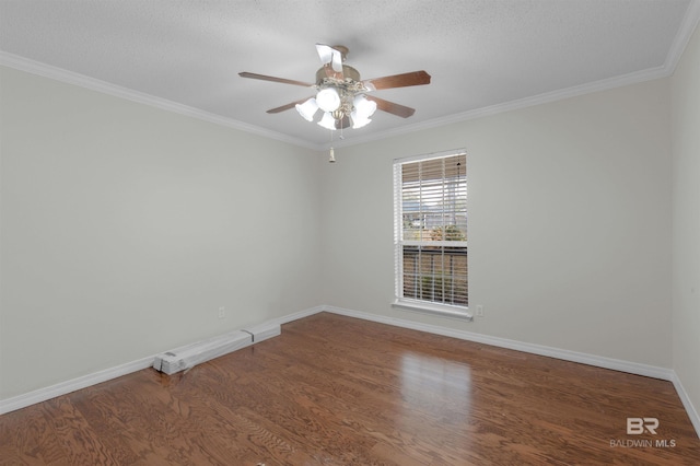 empty room featuring ornamental molding, wood finished floors, baseboards, and ceiling fan