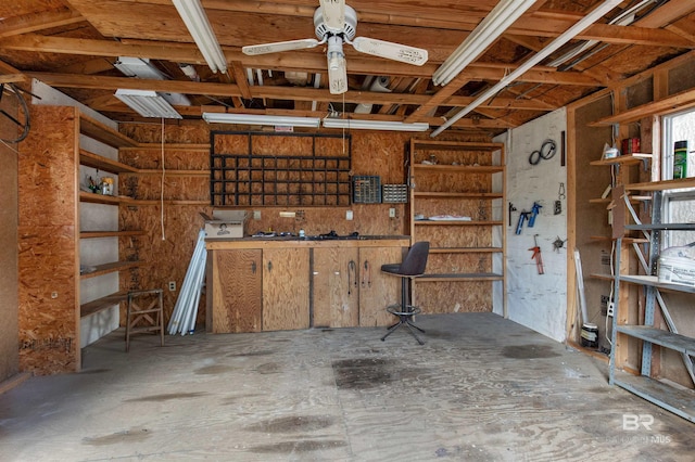 garage with a ceiling fan