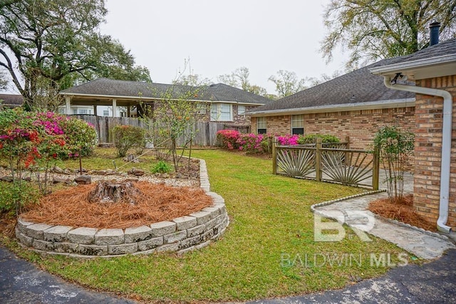 view of yard featuring fence