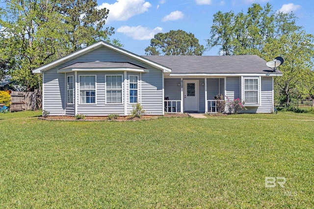 single story home with a porch, fence, and a front lawn