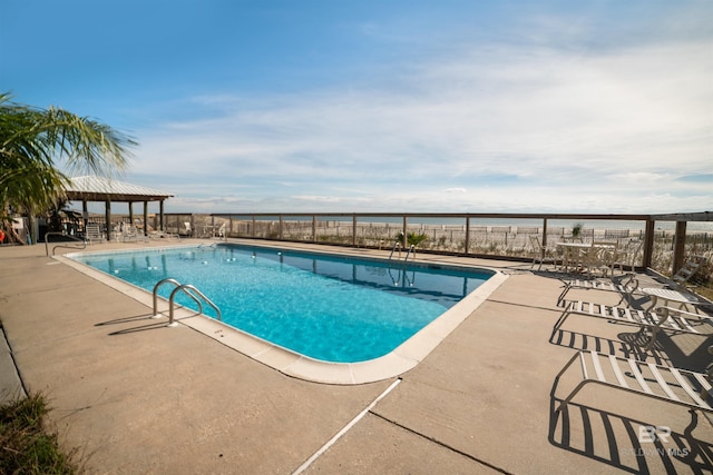 view of pool featuring a patio area and a gazebo