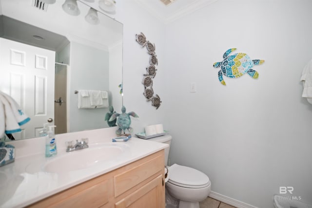 bathroom with toilet, crown molding, tile patterned floors, vanity, and a shower with door