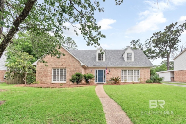 3755 N Claridge Rd, Mobile, AL 36608 - cape cod house featuring brick siding, a front lawn, and roof with shingles