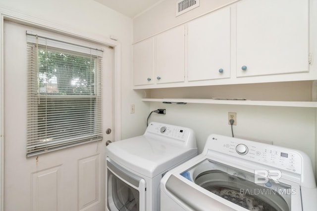 3755 N Claridge Rd, Mobile, AL 36608 - laundry room with washing machine and clothes dryer and cabinet space