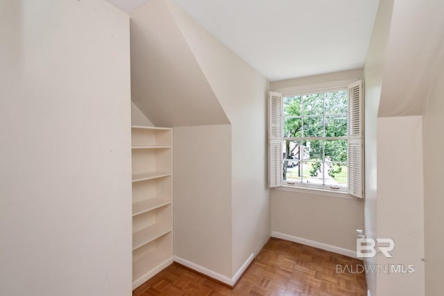 3755 N Claridge Rd, Mobile, AL 36608 - additional living space featuring baseboards and vaulted ceiling