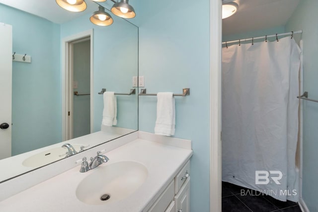 3755 N Claridge Rd, Mobile, AL 36608 - full bathroom featuring vanity, tile patterned floors, and curtained shower