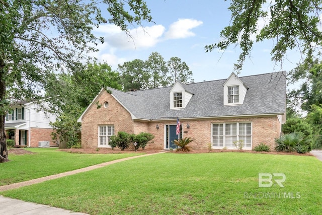3755 N Claridge Rd, Mobile, AL 36608 - cape cod house featuring brick siding, a front lawn, and roof with shingles