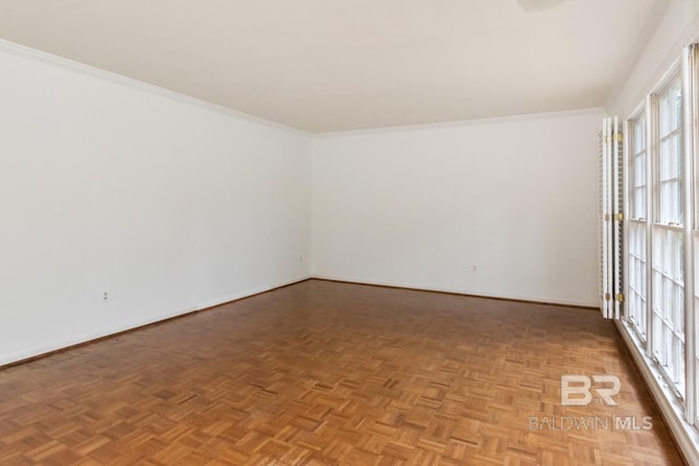 3755 N Claridge Rd, Mobile, AL 36608 - empty room featuring plenty of natural light, baseboards, and ornamental molding