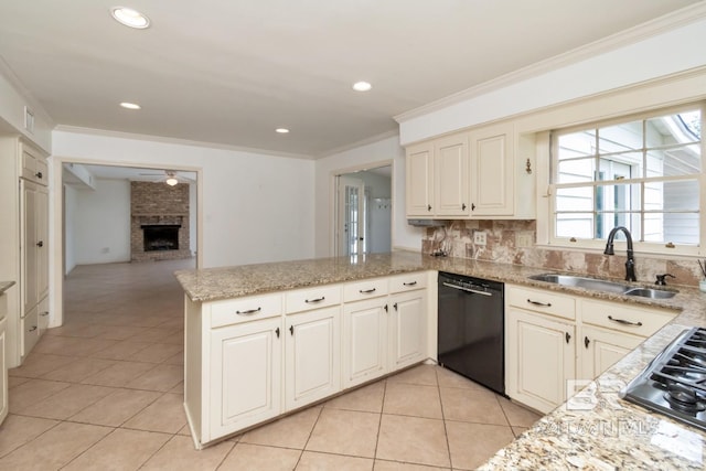 3755 N Claridge Rd, Mobile, AL 36608 - kitchen with dishwasher, a sink, stainless steel gas cooktop, light tile patterned floors, and a peninsula