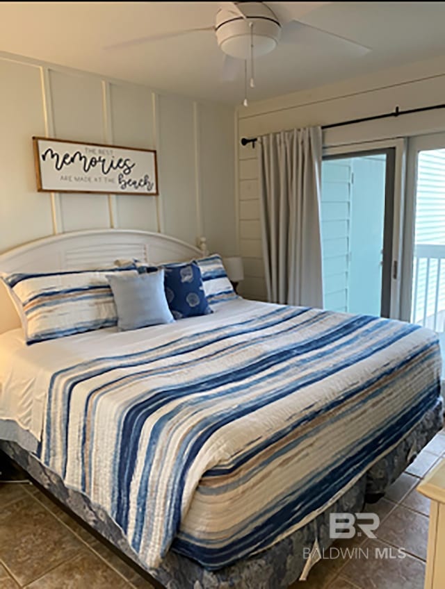 16310 Perdido Key Dr, Pensacola, FL 32507 - bedroom featuring access to exterior, a decorative wall, a ceiling fan, and tile patterned flooring