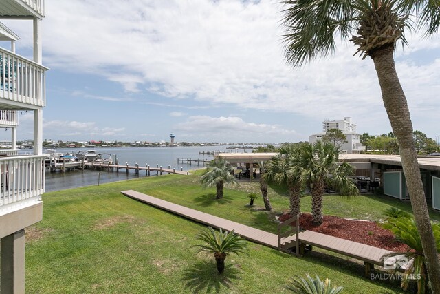 16310 Perdido Key Dr, Pensacola, FL 32507 - view of green lawn with a water view and a dock